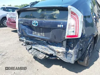 2014 Toyota Prius Four z VIN JTDKN3DU2E1771831, wystawiony jako IAAI lot #42493216 z przebiegiem 202 716 mil mil oraz . Historia ofert i sprzedaży dostępna na DreamBid. Obrazek 6.