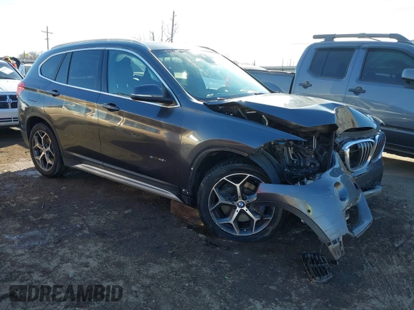 2017 BMW X1 sDrive28i with VIN WBXHU7C30H5H32753, listed as a IAAI auction lot 41441791 with 100,072 mi miles. Bid and sale history available at carsss.com. Image 1.
