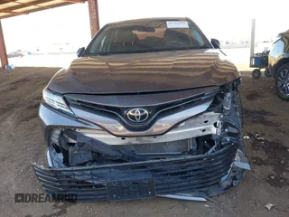 2020 Toyota Camry LE with VIN 4T1C11AK6LU919672, listed as a IAAI auction lot 41726103 with 66,367 mi miles. Bid and sale history available at carsss.com. Image 6.
