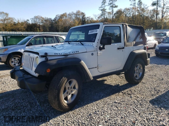 2010 Jeep Wrangler Rubicon with VIN 1J4BA6D17AL132002, listed as a Copart auction lot 83869124 with 183,507 mi miles and Salvage title. Bid and sale history available at DreamBid. Image 1.