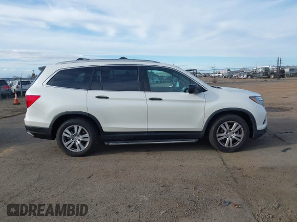 2016 Honda Pilot LX with VIN 5FNYF6H1XGB009768, listed as a IAAI auction lot 41666109 with 137,733 mi miles. Bid and sale history available at carsss.com. Image 13.