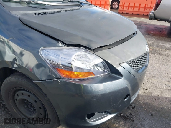 2010 Toyota Yaris with VIN JTDBT4K37A4068398, listed as a IAAI auction lot 40915313 with 123,222 mi miles. Bid and sale history available at carsss.com. Image 6.