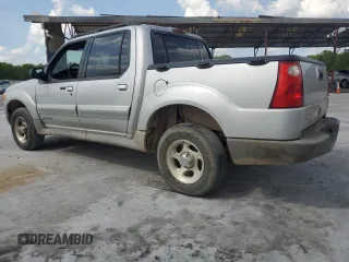 2002 Ford Explorer Sport Trac Value with VIN 1FMZU67E72UB31269, listed as a Copart auction lot 54994265 with 237,124 mi miles and Salvage title. Bid and sale history available at DreamBid. Image 2.