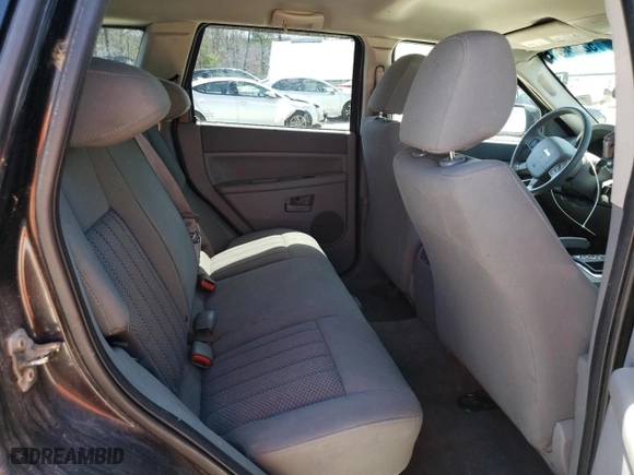 2005 Jeep Grand Cherokee Laredo with VIN 1J4GR48K95C628365, listed as a Copart auction lot 52524515 with 214,630 mi miles and Clean Title. Bid and sale history available at carsss.com. Image 11.