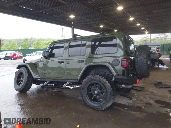 2021 Jeep Wrangler Unlimited Rubicon with VIN 1C4HJXFG4MW543254, listed as a IAAI auction lot 42316180 with 50,696 mi miles and . Bid and sale history available at DreamBid. Image 14.