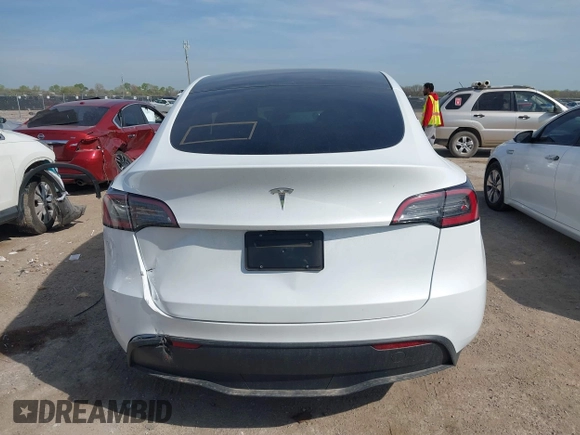 2025 Tesla Model Y Long Range z VIN 7SAYGDED7SA373784, wystawiony jako IAAI lot #41881719 z przebiegiem 1 192 mil mil oraz . Historia ofert i sprzedaży dostępna na DreamBid. Obrazek 16.