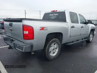 2011 Chevrolet Silverado 1500 LT with VIN 3GCPKSE30BG219790, listed as a IAAI auction lot 41163358 with 152,503 mi miles. Bid and sale history available at carsss.com. Image 4.