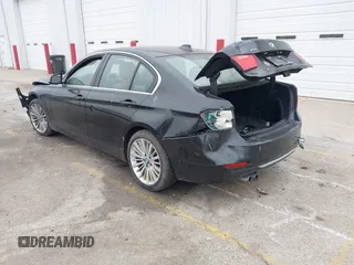 2014 BMW 3 Series 328i xDrive with VIN WBA3B5G56ENS06534, listed as a IAAI auction lot 41549553 with 165,779 mi miles and . Bid and sale history available at DreamBid. Image 3.