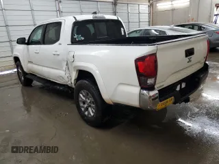 2018 Toyota Tacoma SR5 with VIN 3TMAZ5CN7JM074058, listed as a Copart auction lot 51586455 with 117,877 mi miles and Salvage Title. Bid and sale history available at DreamBid. Image 2.