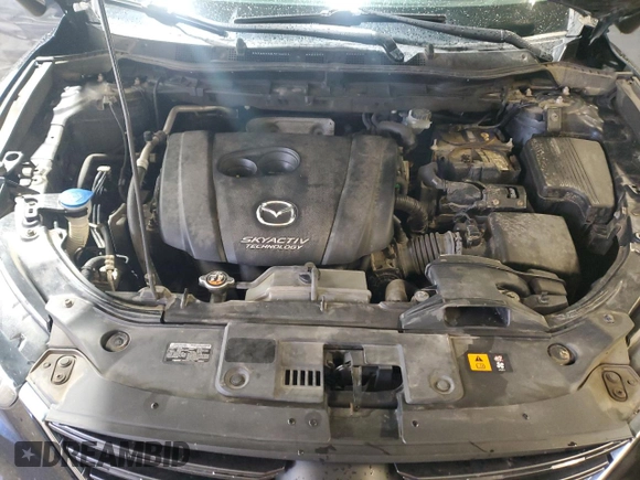 2016 Mazda CX-5 Touring z VIN JM3KE4CY4G0838908, wystawiony jako Copart lot #57961625 z przebiegiem 178 615 mil mil oraz Szkoda całkowita • Salvage title. Historia ofert i sprzedaży dostępna na DreamBid. Obrazek 12.
