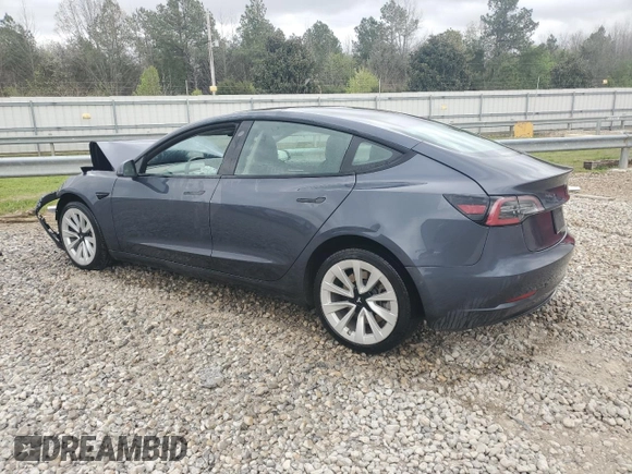 2022 Tesla Model 3 with VIN 5YJ3E1EA4NF371483, listed as a Copart auction lot 49287665 with 59,476 mi miles and Salvage Title. Bid and sale history available at DreamBid. Image 2.