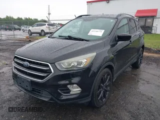 2017 Ford Escape SE with VIN 1FMCU0GD3HUD07141, listed as a IAAI auction lot 42250771 with 116,086 mi miles and . Bid and sale history available at DreamBid. Image 19.