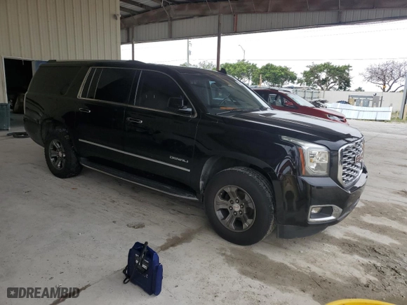 2020 GMC Yukon XL Denali with VIN 1GKS1HKJ6LR127236, listed as a Copart auction lot 51928885 with 143,579 mi miles and Salvage Title. Bid and sale history available at carsss.com. Image 4.