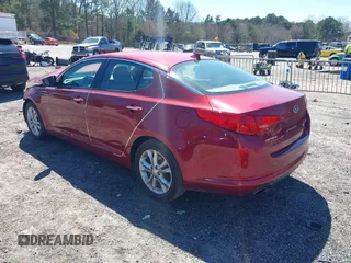 2013 Kia Optima EX with VIN 5XXGN4A70DG242438, listed as a IAAI auction lot 41812356 with 105,000 mi miles. Bid and sale history available at carsss.com. Image 3.