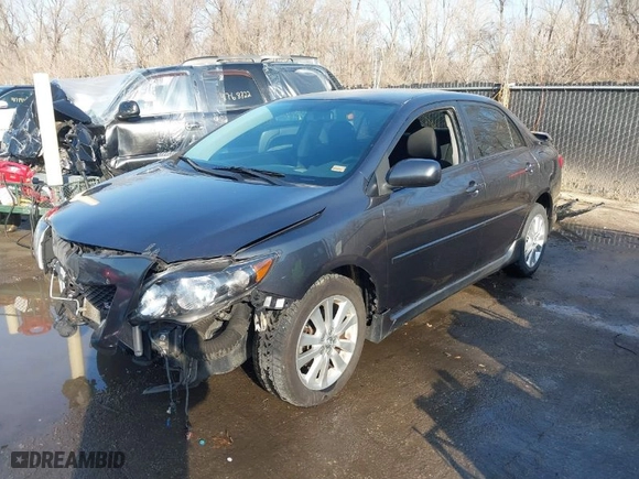 2010 Toyota Corolla with VIN 1NXBU4EE7AZ316204, listed as a IAAI auction lot 41767026 with 121,323 mi miles. Bid and sale history available at carsss.com. Image 2.