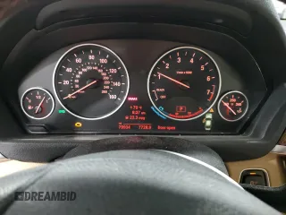 2014 BMW 3 Series 328i xDrive with VIN WBA3B5G50ENS10367, listed as a Copart auction lot 61578605 with 79,934 mi miles and Salvage title. Bid and sale history available at DreamBid. Image 9.