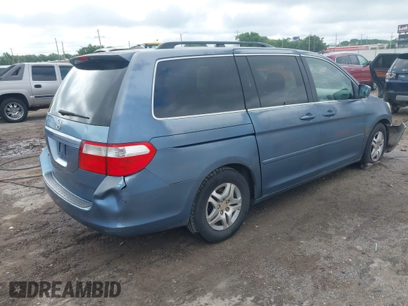 2007 Honda Odyssey EX with VIN 5FNRL384X7B063481, listed as a IAAI auction lot 42352096 with 106,047 mi miles and . Bid and sale history available at DreamBid. Image 4.