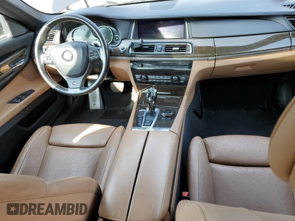 2015 BMW 7 Series 750i xDrive with VIN WBAYB6C53FD966042, listed as a Copart auction lot 69387464 with 64,977 mi miles and Salvage Title. Bid and sale history available at carsss.com. Image 8.