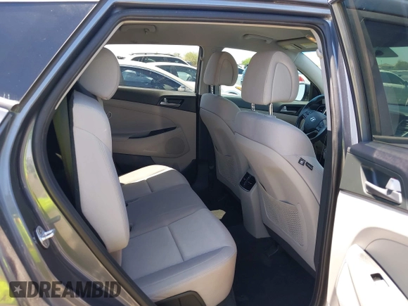 2017 Hyundai Tucson Value with VIN KM8J33A29HU312752, listed as a IAAI auction lot 42575164 with 76,297 mi miles and . Bid and sale history available at DreamBid. Image 8.