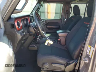 2019 Jeep Wrangler Unlimited Rubicon with VIN 1C4HJXFN1KW502477, listed as a Copart auction lot 52441455 with 53,110 mi miles and Salvage title. Bid and sale history available at DreamBid. Image 7.