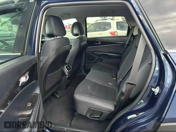 2016 Kia Sorento LX with VIN 5XYPGDA5XGG142632, listed as a IAAI auction lot 42143508 with 146,966 mi miles. Bid and sale history available at carsss.com. Image 7.