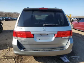 2010 Honda Odyssey EX-L with VIN 5FNRL3H62AB031763, listed as a Copart auction lot 52800055 with 220,450 mi miles and Salvage Title. Bid and sale history available at DreamBid. Image 6.