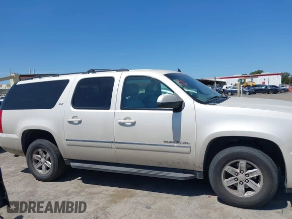 2012 GMC Yukon XL SLT z VIN 1GKS2LE74CR100438, wystawiony jako IAAI lot #42319226 z przebiegiem 172 628 mil mil oraz . Historia ofert i sprzedaży dostępna na DreamBid. Obrazek 13.