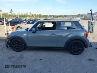 2020 MINI Hardtop Cooper S z VIN WMWXR5C00L2M23924, wystawiony jako IAAI lot #41520706 z przebiegiem 123 006 mil mil oraz . Historia ofert i sprzedaży dostępna na DreamBid. Obrazek 14.