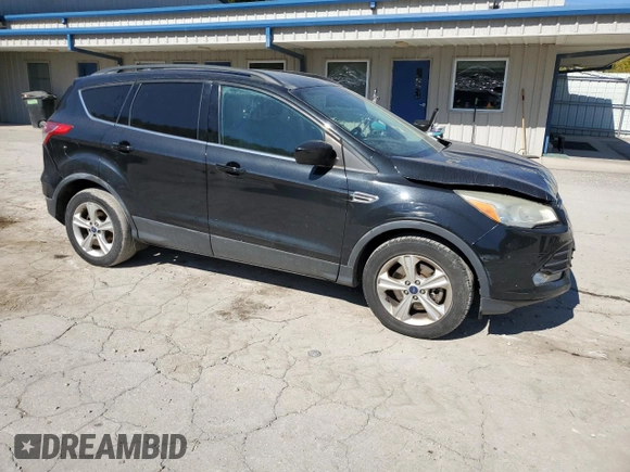 2014 Ford Escape SE with VIN 1FMCU9GX1EUB06543, listed as a Copart auction lot 75326984 with 119,881 mi miles and Salvage title. Bid and sale history available at DreamBid. Image 4.