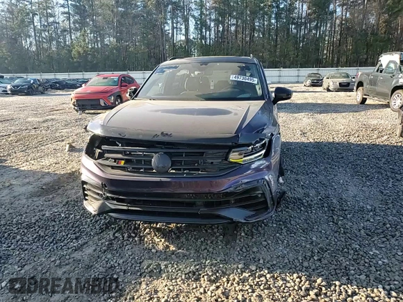 2023 Volkswagen Tiguan SE R-Line Black with VIN 3VV8B7AX5PM127059, listed as a Copart auction lot 49730495 with 33,068 mi miles and Salvage Title. Bid and sale history available at DreamBid. Image 12.