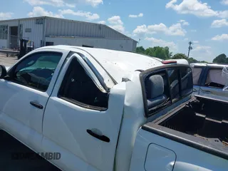 2015 Toyota Tacoma with VIN 3TMLU4EN1FM195626, listed as a IAAI auction lot 42571649 with 135,699 mi miles and . Bid and sale history available at DreamBid. Image 6.