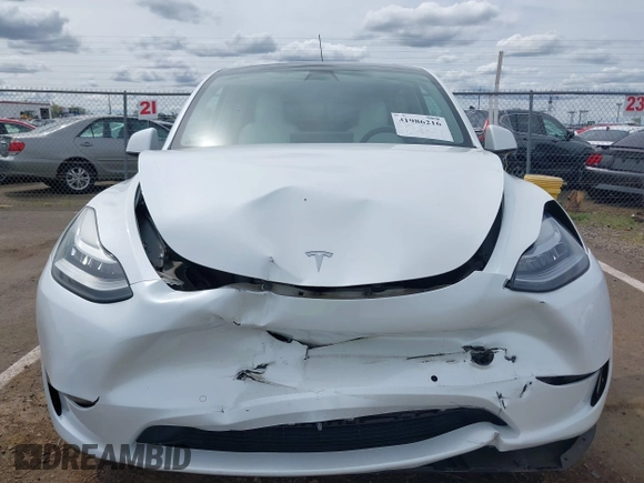 2022 Tesla Model Y Long Range with VIN 7SAYGDEE2NF403354, listed as a IAAI auction lot 41986216 with 53,177 mi miles and . Bid and sale history available at DreamBid. Image 12.