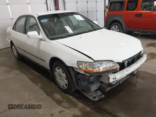 1999 Honda Accord LX with VIN JHMCG5648XC049633, listed as a IAAI auction lot 42518968 with 124,489 mi miles and . Bid and sale history available at DreamBid. Image 1.