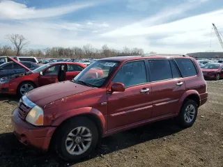 2004 Suzuki XL-7 LX with VIN JS3TX92V144114305, listed as a Copart auction lot 50074015 with 196,068 mi miles and Salvage Title. Bid and sale history available at carsss.com. Image 1.