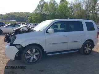 2013 Honda Pilot Touring with VIN 5FNYF3H92DB034731, listed as a IAAI auction lot 42049853 with 127,278 mi miles and . Bid and sale history available at DreamBid. Image 14.