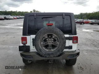 2016 Jeep Wrangler Unlimited Sahara with VIN 1C4BJWEGXGL245041, listed as a Copart auction lot 88099245 with 134,768 mi miles and Salvage title. Bid and sale history available at DreamBid. Image 6.