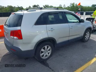 2012 Kia Sorento LX with VIN 5XYKTDA66CG295646, listed as a IAAI auction lot 42225434 with 139,961 mi miles and . Bid and sale history available at DreamBid. Image 4.