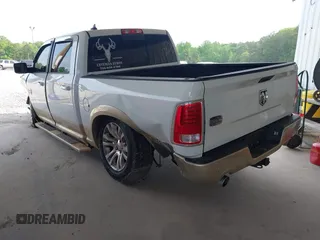 2014 Ram 1500 Longhorn z VIN 1C6RR6PT0ES129729, wystawiony jako IAAI lot #42018089 z przebiegiem 126 074 mil mil oraz . Historia ofert i sprzedaży dostępna na DreamBid. Obrazek 3.