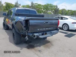 2019 Toyota Tacoma SR with VIN 3TMCZ5AN3KM207783, listed as a IAAI auction lot 42375280 with 55,784 mi miles and . Bid and sale history available at DreamBid. Image 6.
