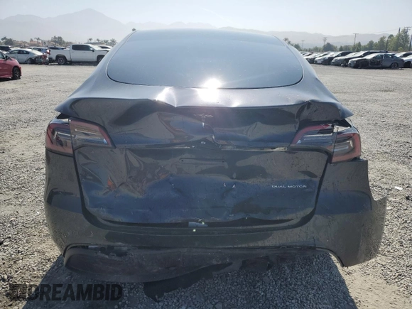 2024 Tesla Model Y Long Range z VIN 7SAYGDEE3RF121102, wystawiony jako Copart lot #60548895 z przebiegiem 13 336 mil mil oraz Szkoda całkowita • Salvage title. Historia ofert i sprzedaży dostępna na DreamBid. Obrazek 6.