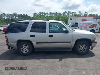 2006 Chevrolet Tahoe LS z VIN 1GNEC13V86R135510, wystawiony jako IAAI lot #42123092 z przebiegiem 370 153 mil mil oraz . Historia ofert i sprzedaży dostępna na DreamBid. Obrazek 13.