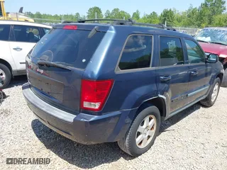 2009 Jeep Grand Cherokee Laredo with VIN 1J8GS48K79C539659, listed as a IAAI auction lot 42063431 with 1 mi miles. Bid and sale history available at carsss.com. Image 4.