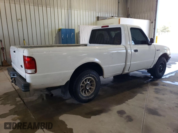 2000 Ford Ranger XL with VIN 1FTYR10V1YTA13232, listed as a Copart auction lot 54483055 with 217,473 mi miles and Salvage Title. Bid and sale history available at DreamBid. Image 3.