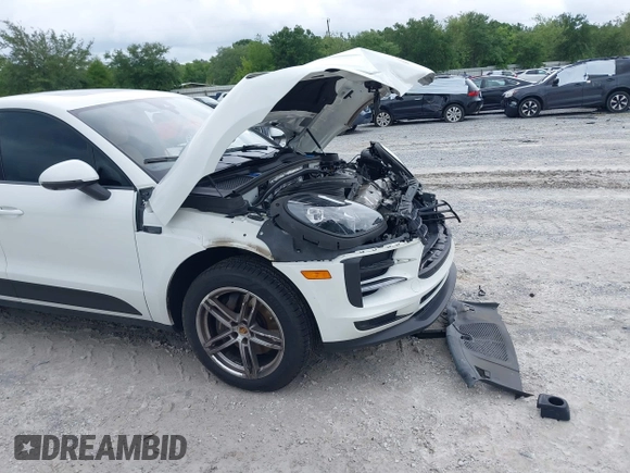 2021 Porsche Macan with VIN WP1AA2A52MLB06086, listed as a IAAI auction lot 39423611 with 56,559 mi miles and . Bid and sale history available at DreamBid. Image 6.