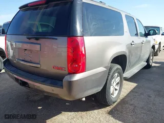 2013 GMC Yukon XL SLT with VIN 1GKS2KE70DR303872, listed as a IAAI auction lot 41659911 with 199,202 mi miles. Bid and sale history available at carsss.com. Image 4.