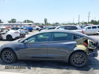 2023 Tesla Model 3 with VIN 5YJ3E1EA4PF400306, listed as a IAAI auction lot 42398603 with 18,551 mi miles and . Bid and sale history available at DreamBid. Image 15.