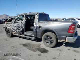 2020 Ram 1500 Laramie with VIN 1C6RREJT5LN139087, listed as a Copart auction lot 56407905 with 122,899 mi miles and Salvage title. Bid and sale history available at DreamBid. Image 2.