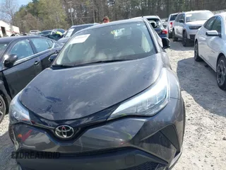 2021 Toyota C-HR LE with VIN NMTKHMBX3MR128835, listed as a IAAI auction lot 41891619 with 57,744 mi miles and . Bid and sale history available at DreamBid. Image 12.