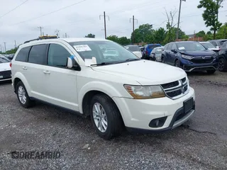 2017 Dodge Journey SXT with VIN 3C4PDDBG2HT702775, listed as a IAAI auction lot 42596303 with 130,639 mi miles and . Bid and sale history available at DreamBid. Image 1.