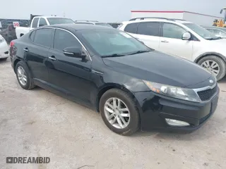 2013 Kia Optima LX with VIN 5XXGM4A70DG249828, listed as a IAAI auction lot 42074167 with 143,986 mi miles. Bid and sale history available at carsss.com. Image 1.